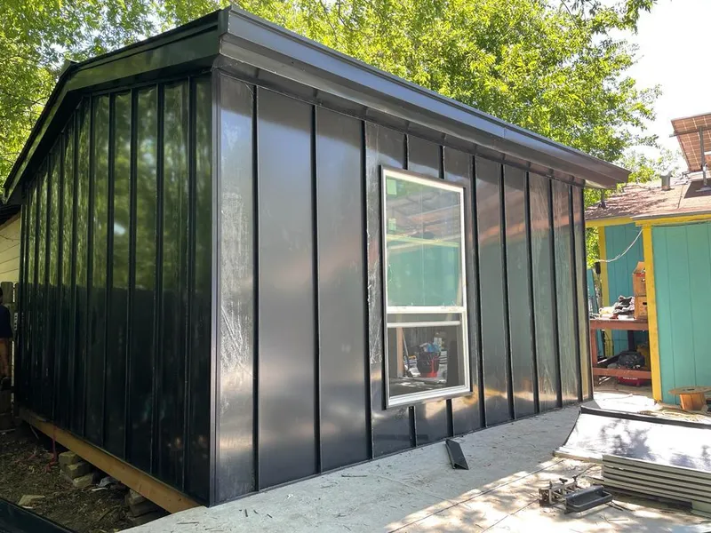 Black standing seam metal wall panels for Roof Inspection in Atlanta