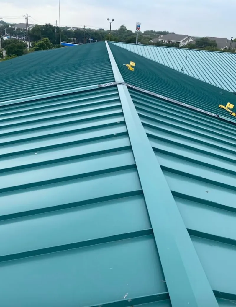 Green commercial metal roof ridge and valley for Metal Roof Repair in Atlanta